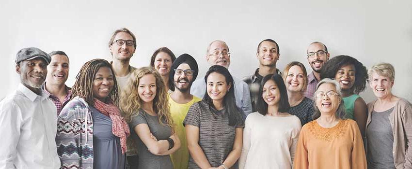 group of people standing together looking at the camera